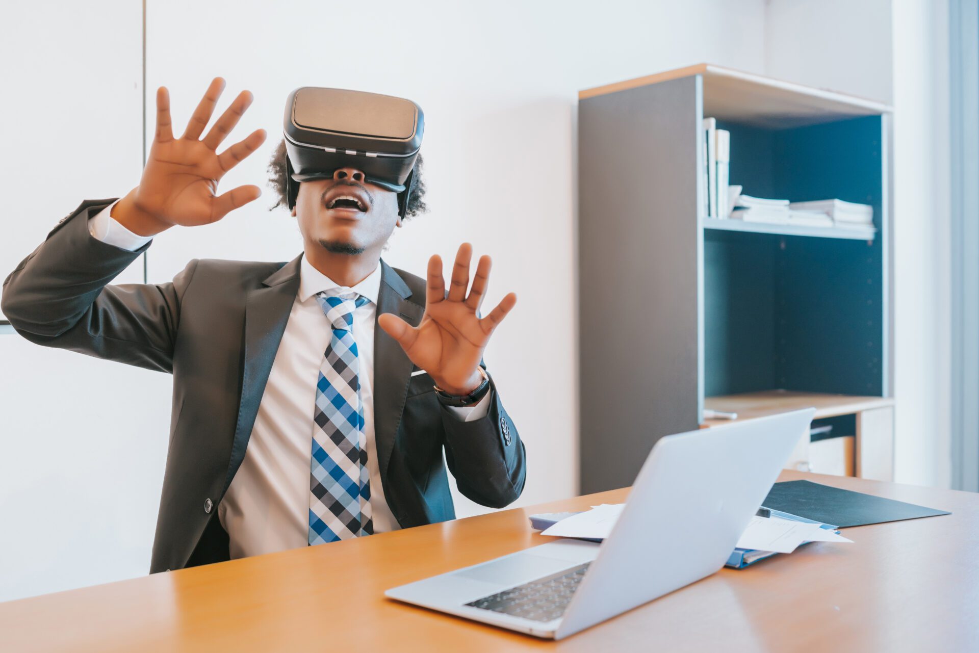 Businessman using virtual reality headset